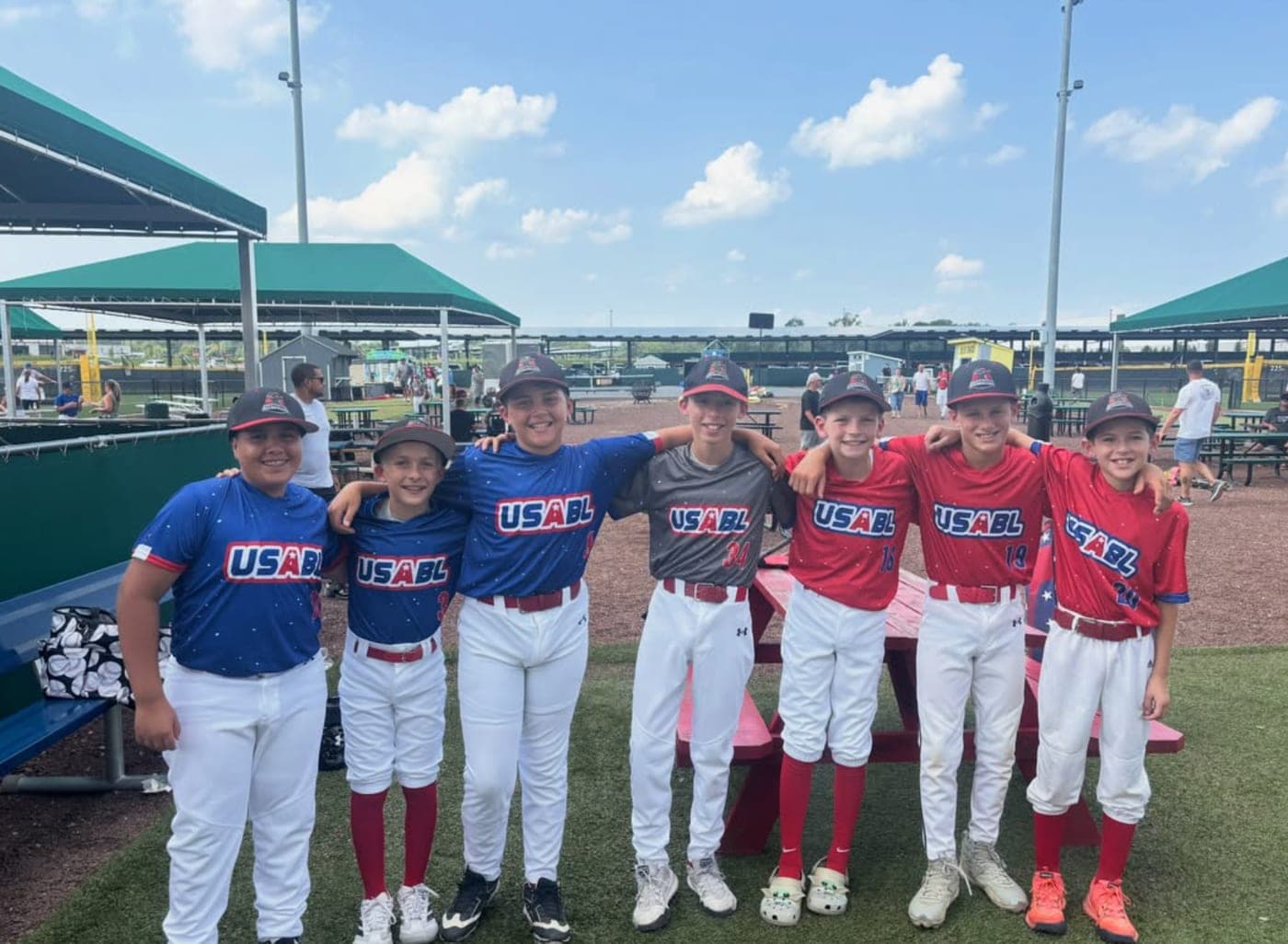 A USABL youth team lined up in front of the dugout